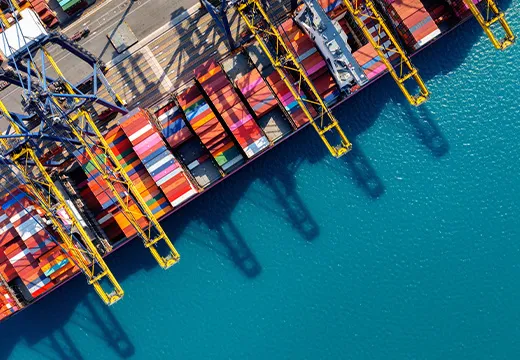Container ship loaded with cargo on the open sea